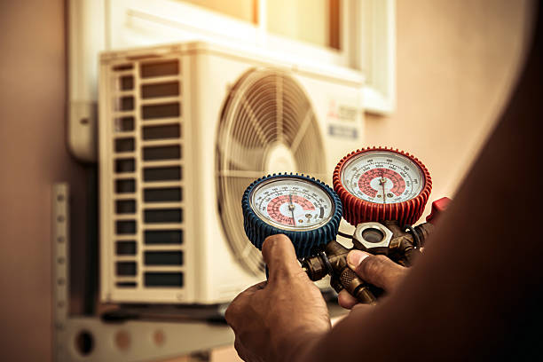 Professional Ac Installation technician working in Elwood, NY